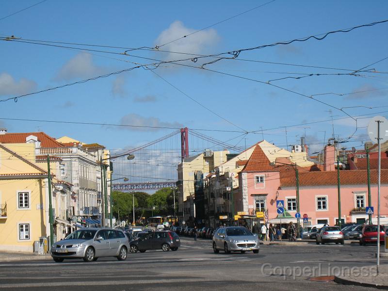 IMG_4614.JPG - Back outside, the street in Belém, looking back towards that bridge.